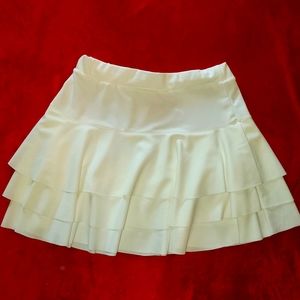 White three-tiered mini skirt